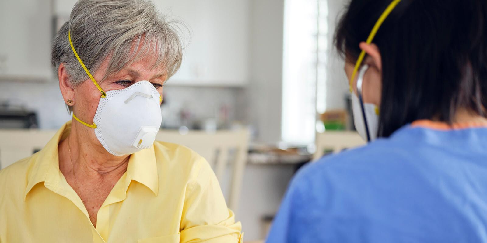 Elderly woman in face mask